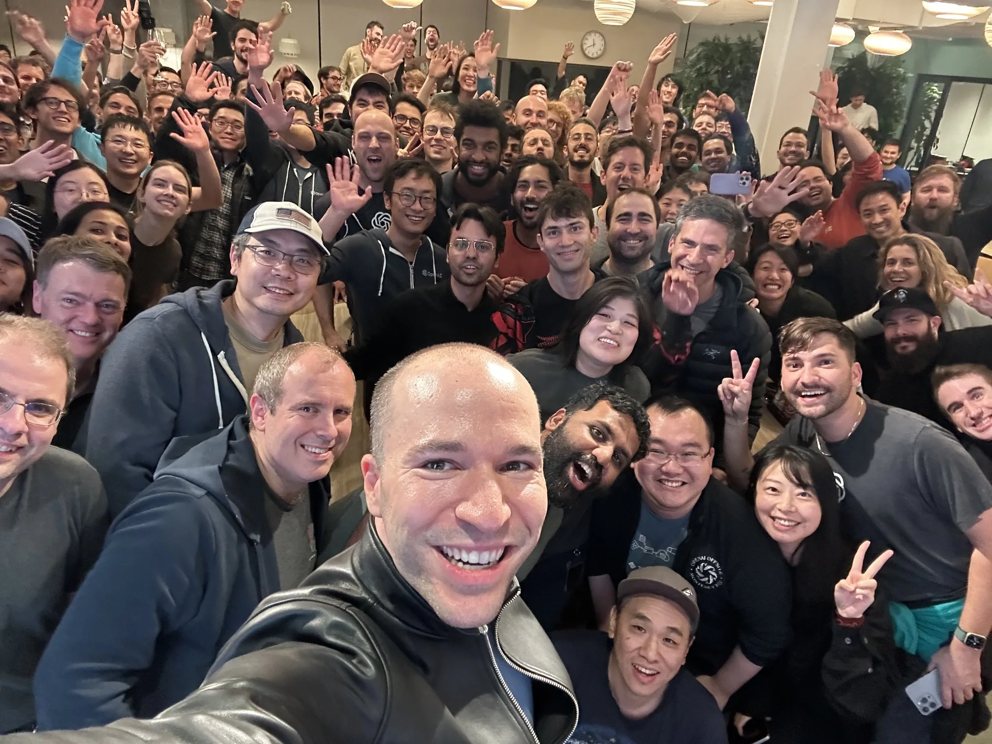 OpenAI President Greg Brockman, who is returning to OpenAI alongside Altman, with the OpenAI team at the company's offices. Photo by Greg Brockman.